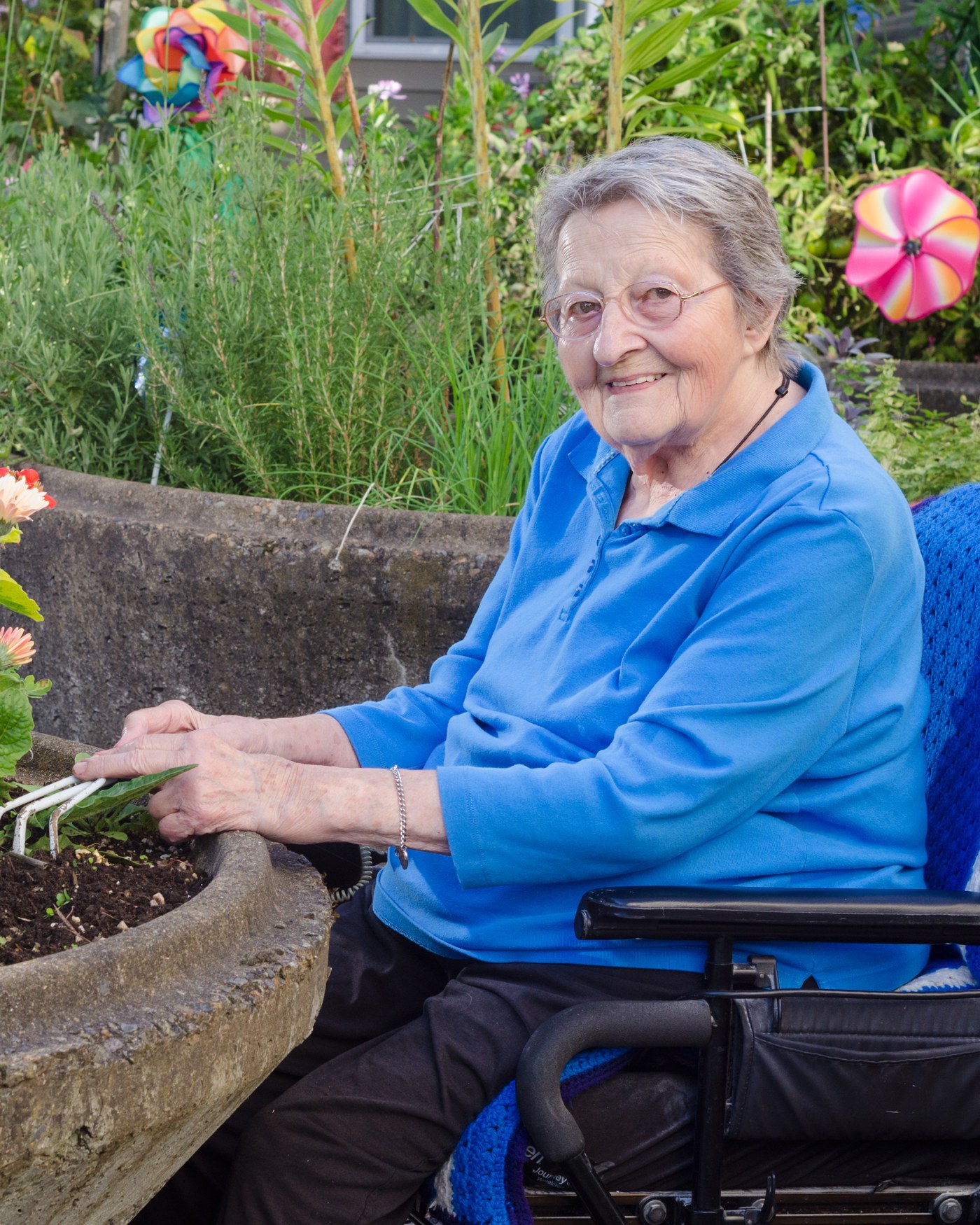 A tender moment between a caregiver and resident at Marian Place